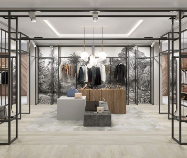 Modern clothing store interior with hanging lights.